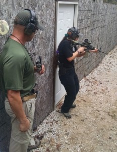 CSAT student practices clearing a live-fire shoot house during UDC.