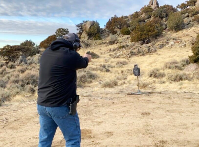 The author shooting on his home range with Blackhawk L2D holster, Glock 17, and Streamlight TLR-1